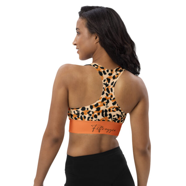 The back of a leopard print sports bra